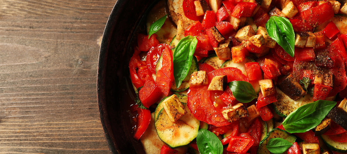 Tasty vegetarian ratatouille made of eggplants, squash, tomatoes